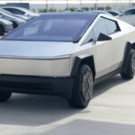 Tesla Faces Stock Dip Amid Production Halts and Robotaxi Rollout