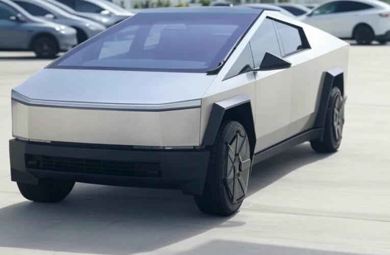 Tesla Faces Stock Dip Amid Production Halts and Robotaxi Rollout